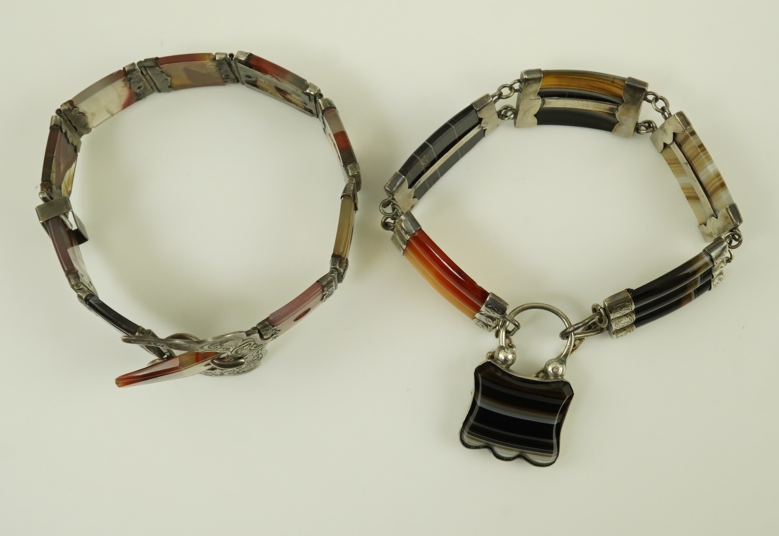 Two late 19th century Scottish silver and agate set bracelets